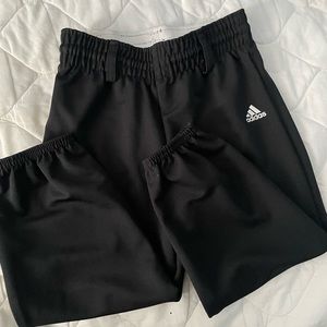 Kids baseball pants and (2) pairs of shorts.